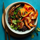 <p>This shrimp rice bowl gets its kick from fiery gochugaru—Korean-style red pepper flakes. Don't let that carrot-pickling liquid go to waste! We stir it into the cooked rice in these bowls to really bump up the flavor. <a href="https://www.eatingwell.com/recipe/7871854/gochugaru-shrimp-black-rice-bowls/" rel="nofollow noopener" target="_blank" data-ylk="slk:View Recipe;elm:context_link;itc:0;sec:content-canvas" class="link ">View Recipe</a></p>