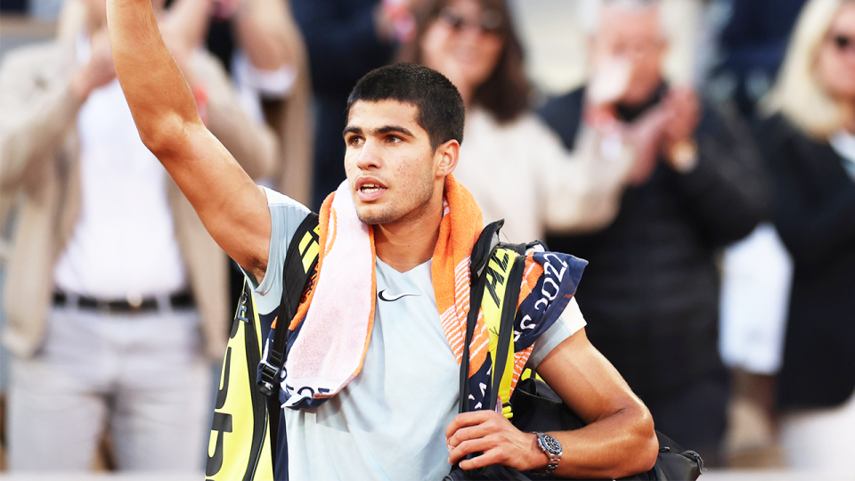 Carlos Alcaraz (pictured) waving goodbye to the crowd at the French Open.