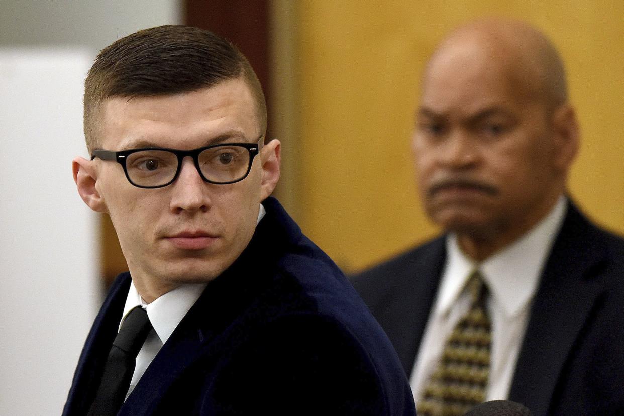 Volodymyr Zhukovskyy looks back at the gallery before closing statements started at his trial at Coos County Superior Court in Lancaster, N.H., Tuesday.