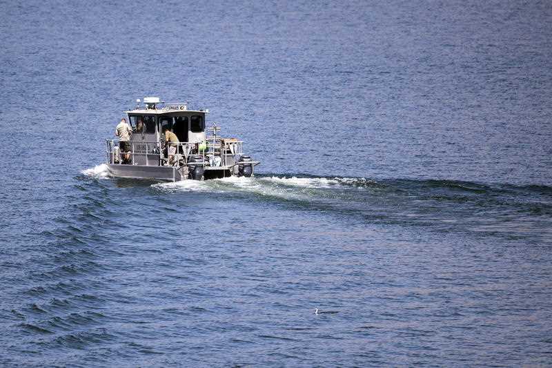 Los Angeles Sheriffs Department boat looks for missing US actress Naya Rivera on Lake Piru as searches continue after her disappearance while boating with her young son in Los Padres National Forest, California.