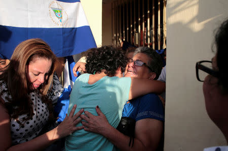 Maria Adilia Peralta, who according to local media was arrested for participating in a protest against Nicaraguan President Daniel Ortega's government, embraces a relative after being released from La Esperanza Prison, in Masaya, Nicaragua May 20, 2019.REUTERS/Oswaldo Rivas