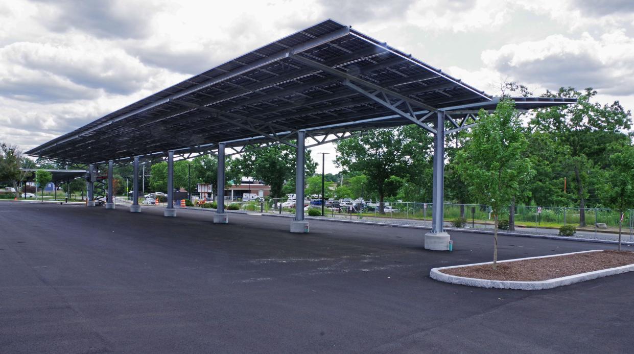 The new parking lot outside the emergency room entrance at Brockton Hospital has a roof with solar panels, seen here on Wednesday, Aug. 2, 2023. The hospital has been shuttered since a 10-alarm fire on Feb. 7, 2023.