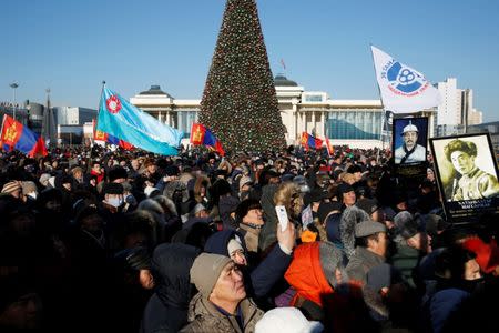 Protesters attend a demonstration to demand the resignation of Mongolia's parliamentary speaker Enkhbold Miyegombo, at Sukhbaatar Square in Ulaanbaatar, Mongolia December 27, 2018. REUTERS/B. Rentsendorj