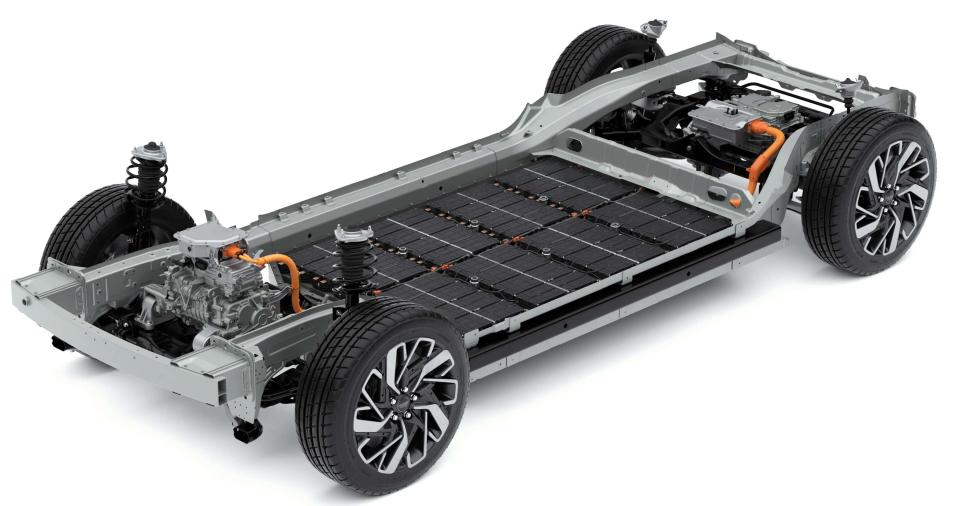 A cutaway image of Hyundai's E-GMP dedicated EV platform showing the skateboard battery pack and drive motors.