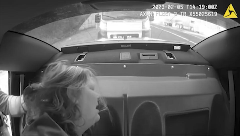 This image provided by the Knoxville Police Department shows police video footage from the Feb. 5, 2023 arrest of Lisa Edwards, who later died at Fort Sanders Regional Medical Center in Knoxville, Tenn. (Knoxville Police Department via AP)