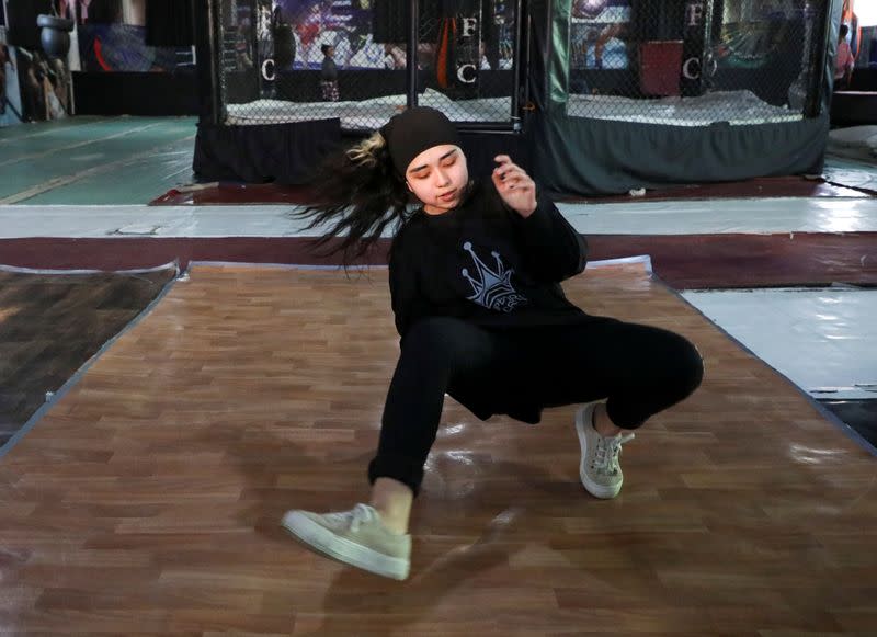 Afghan youth practise breakdancing during a training session in Kabul