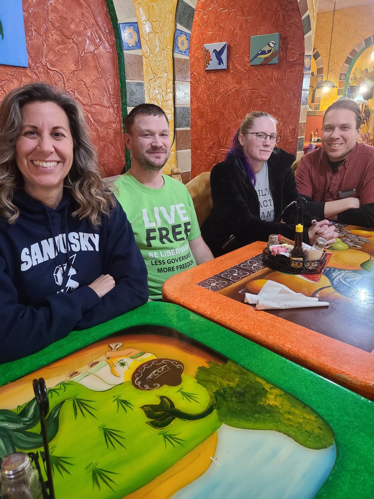 Area members of the Libertarian Party met for a casual discussion on being a third party. Left to right are Melanie Kempton, Affiliate Development Coordinator; Joshua Lape; Logan Dodl; and Ben Machoukas.