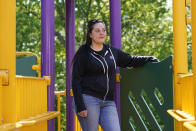 Erica Lafferty, whose mother Dawn Lafferty Hochsprung was killed during the Sandy Hook school shooting in 2012, poses for a picture on the playground honoring her mother in Watertown, Conn., Wednesday, May 25, 2022. A program manager at Everytown for Gun Safety and an advocate for universal background checks, Erica Lafferty said gains have been made quietly in states around the country. (AP Photo/Seth Wenig)