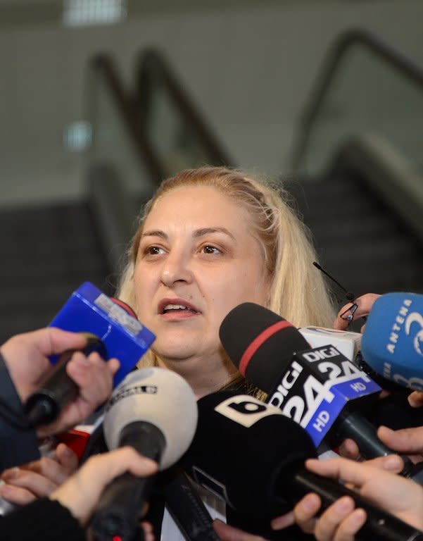 Doina Lupu -- the lawyer of Radu Dogaru -- answers questions outside the High Court in Bucharest, on January 25, 2013. A Bucharest court has opened and then immediately adjourned the trial of six Romanians charged with a spectacular heist from a Dutch museum, some of whose stolen masterpieces by Monet, Picasso and Gauguin are feared to have been burned