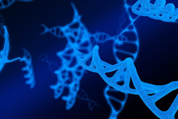 3-D image of DNA molecules floating in a deep blue background.