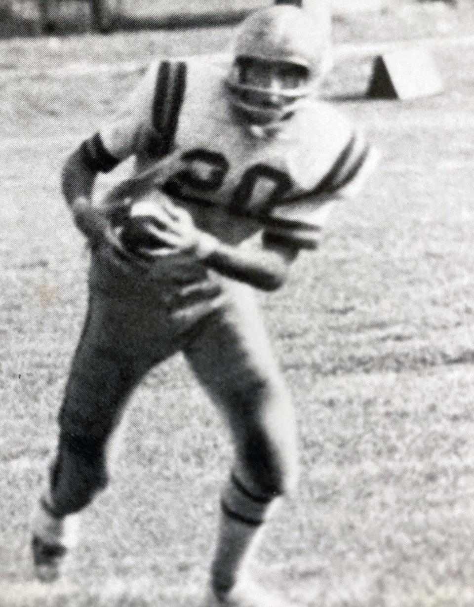 Cardinal Mooney's Con Nicholas returns a punt during a game from the 1972 season.