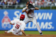 Baltimore Orioles shortstop Richie Martin, right, forces out Philadelphia Phillies' Matt Vierling at second base on a fielder's choice hit into by Didi Gregorius during the seventh inning of an interleague baseball game, Monday, Sept. 20, 2021, in Philadelphia. Gregorius was safe at first on the play. (AP Photo/Matt Slocum)