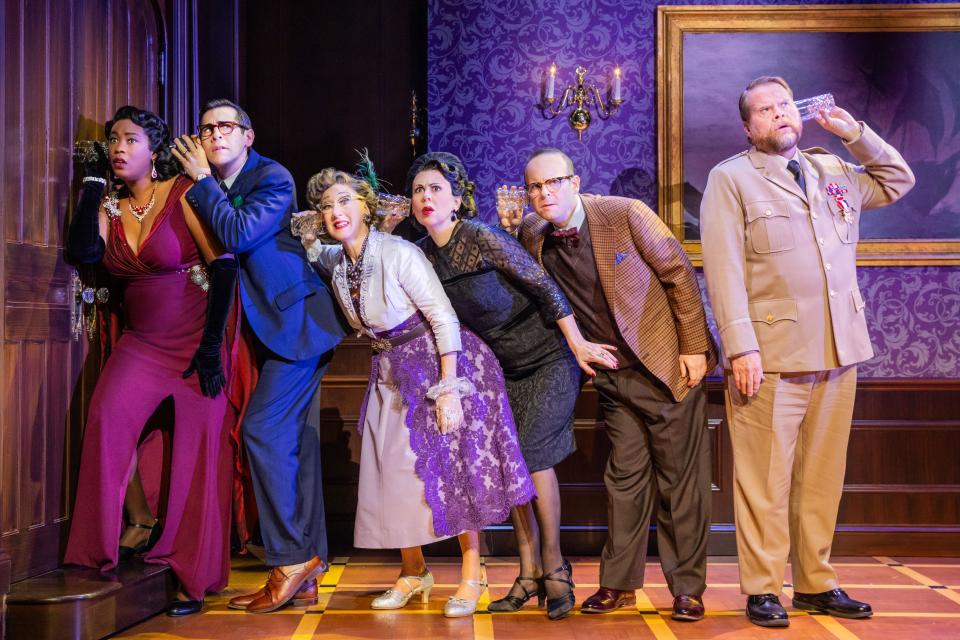 The Company of the North American tour of "Clue."