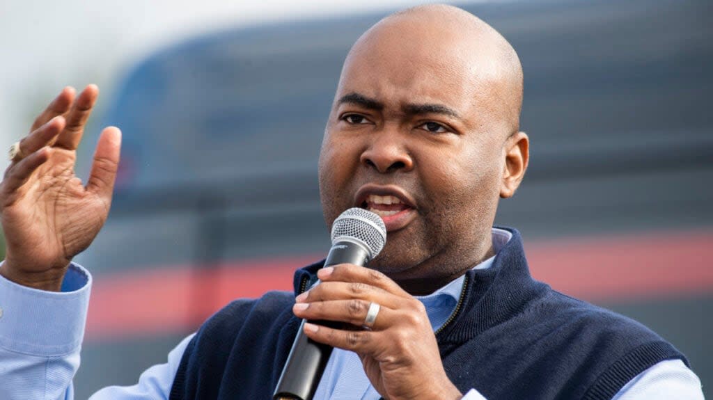 Jaime Harrison, Democratic candidate for South Carolina senate, addresses supporters during a drive-in rally in Anderson, S.C., on Saturday, October 31, 2020. (Photo By Tom Williams/CQ-Roll Call, Inc via Getty Images)