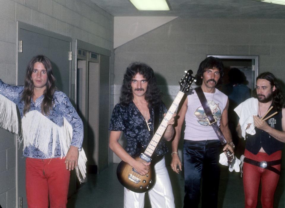 <p>Ozzy Osbourne, Tony Iommi, Geezer Butler and Bill Ward of the heavy metal band Black Sabbath pose for a portrait backstage at Cobo Hall on November 26, 1976 in Detroit, Michigan.</p>