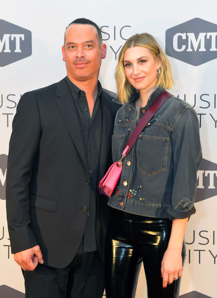 <em>Music City</em> creator Adam DiVello and <em>The Hills</em> star Whitney Port reunite at the premiere party for the Nashville show. (Photo: Mickey Bernal/WireImage)