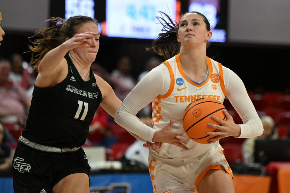 Tennessee Lady Vols guard Avery Strickland (13) drives on Green Bay Phoenix guard Natalie McNeal (11) in the first round of the 2024 NCAA Women's Tournament on March 23, 2024 at James T. Valvano Arena at William Neal Reynolds Coliseum in Raleigh, N.C.