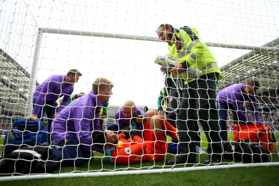 Hugo Lloris receives treatment. (Photo by Bryn Lennon/Getty Images)