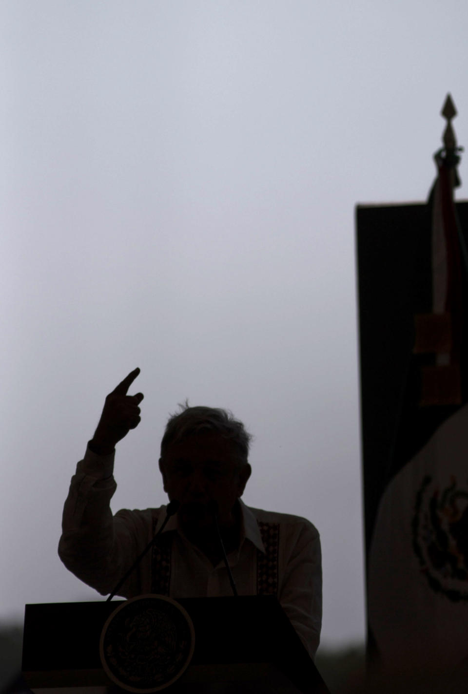 Mexican President Andres Manuel Lopez Obrador gives a speech at a military nature reserve during an event with El Salvadorian President Nayib Bukele, not in picture, near the border town of Tapachula, Mexico, Thursday, June 20, 2019. Lopez Obrador met with El Salvador's president to discuss a development plan that aims to slow a surge of mostly Central American migrants toward the U.S. border. (AP Photo/Oliver de Ros)