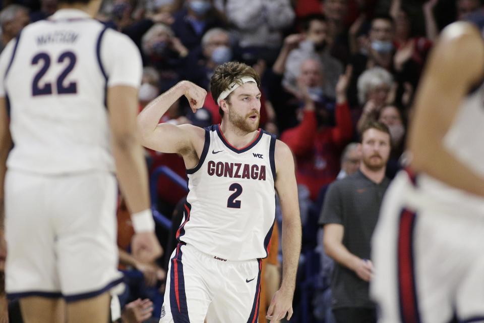 Gonzaga forward Drew Timme (2) celebrates his basket against Texas during the first half of an NCAA college basketball game Saturday, Nov. 13, 2021, in Spokane, Wash.