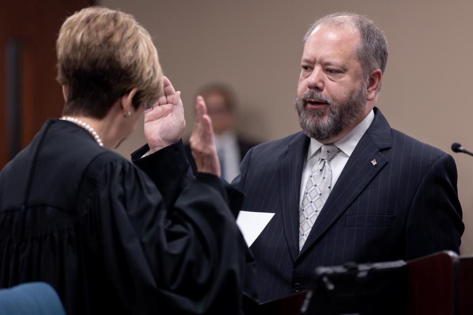 Bill Hicks is sworn into office as the new El Paso County district attorney on Dec. 21, 2022, at the El Paso County Courthouse. Hicks replaced Yvonne Rosales, who resigned in mid-December.