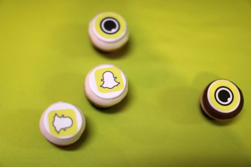 FILE PHOTO: The logo of messaging app Snapchat is seen at a booth at TechFair LA, a technology job fair, in Los Angeles