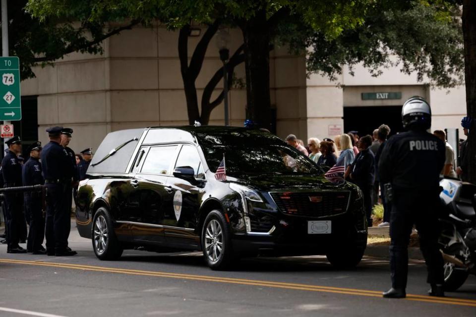 Law officers line up for the processional of Charlotte-Mecklenburg Police Officer Eyer on Friday to First Baptist Church on Friday, May3, 2024. Officer Eyer was killed while serving a warrant in east Charlotte on Monday, April 29, 2024