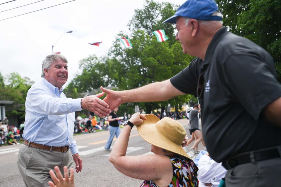 Tennessee Senator Ed Jackson shakes hands with an. during the 86th annual West Tennessee Strawberry Festival Parade in Humboldt, Tenn., on Friday, May 10, 2024.