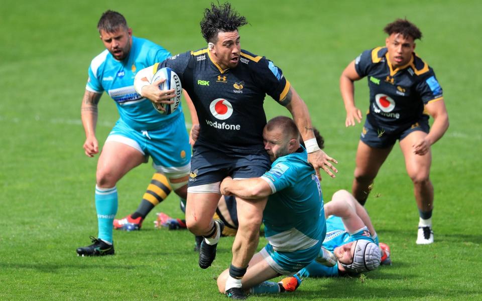 Wasps' Jeff Toomaga-Allen is tackled by Worcester Warriors' Scott Andrews and Niall Annett during his side's win  - PA