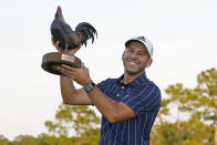 Spain's Sergio Garcia holds the Sanderson Farms Championship trophy after winning the PGA golf tournament in Jackson, Miss., Sunday, Oct. 4, 2020. (AP Photo/Rogelio V. Solis)