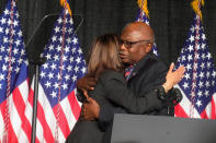 Vice President Kamala Harris, left, and U.S. House Majority Whip Jim Clyburn, right, embrace during a fundraising dinner for the South Carolina Democratic Party on Friday, June 10, 2022, in Columbia, S.C. (AP Photo/Meg Kinnard)