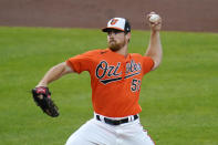 Baltimore Orioles starting pitcher Bruce Zimmermann throws a pitch to the Boston Red Sox during the first inning of a baseball game, Saturday, April 10, 2021, in Baltimore. (AP Photo/Julio Cortez)