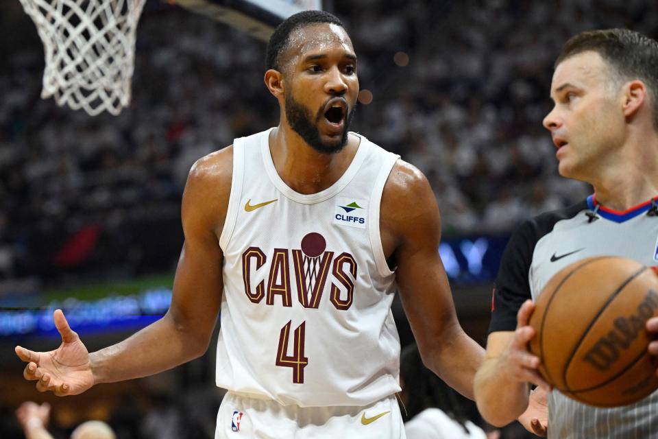 Cavaliers forward Evan Mobley talks to an official in the second quarter of Game 3 of the Eastern Conference semifinals, May 11, 2024, in Cleveland.