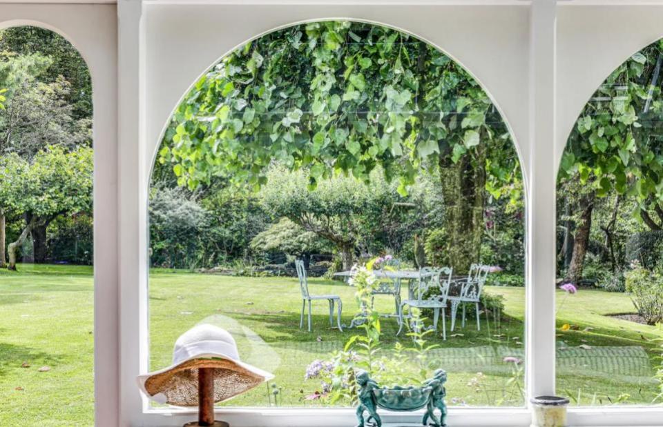 News Shopper: The idyllic gardens are the highlight of this house