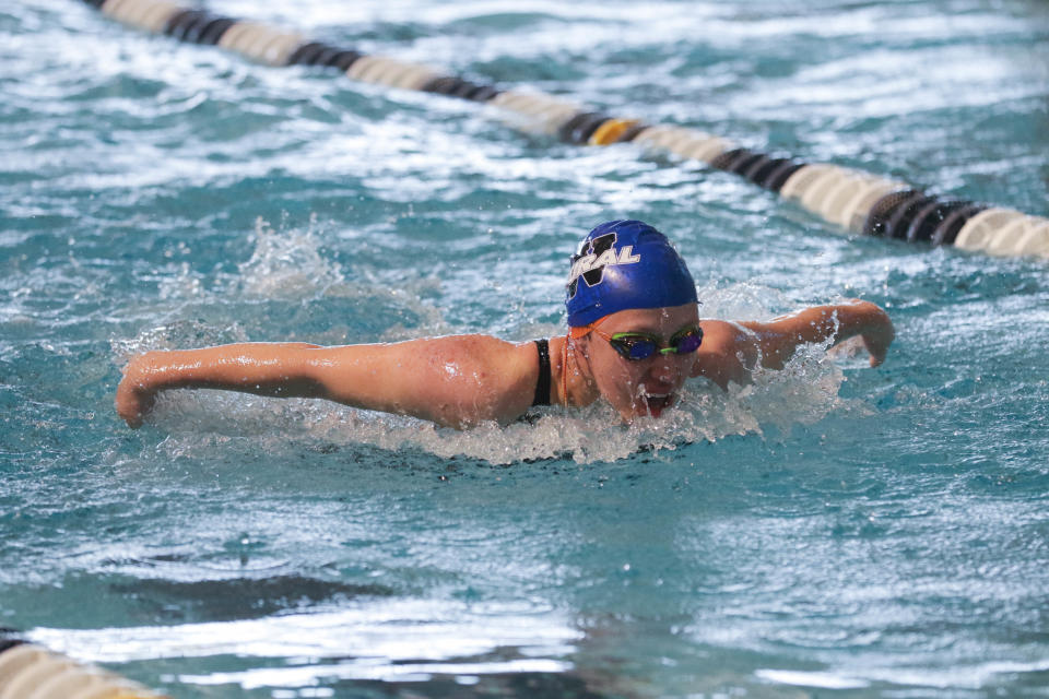 Washburn Rural junior Taryn Lemke competes in the 100 Yard Butterfly Saturday at the Class 6A Girls State Championship at Shawnee Mission School District Aquatic Center.