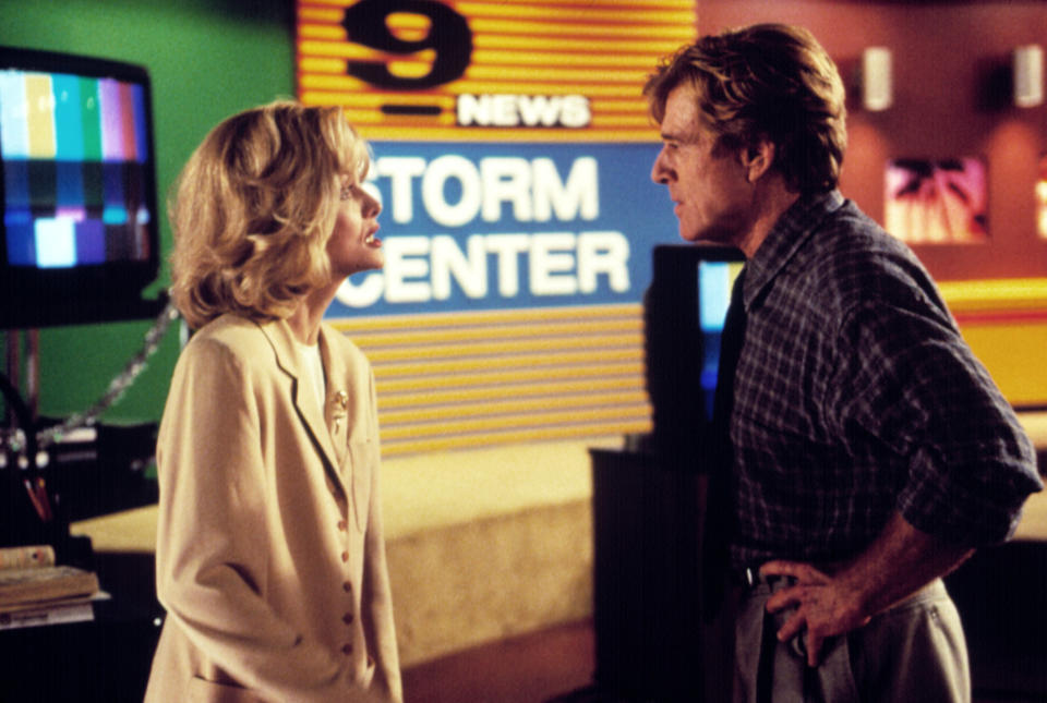 Michelle Pfeiffer and Robert Redford in 1996’s “Up Close and Personal” - Credit: Everett