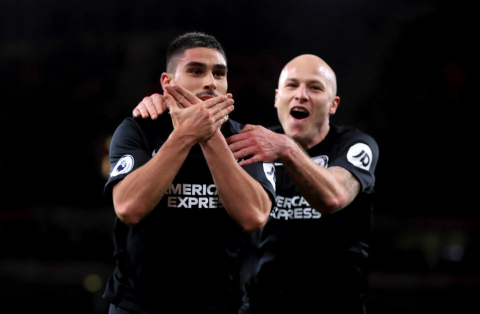 Brighton and Hove Albion's Neal Maupay (left) celebrates scoring his side's second goal of the game during the Premier League match at the Emirates Stadium, London. (Photo by Adam Davy/PA Images via Getty Images)