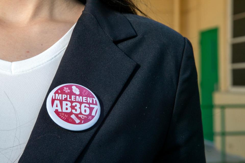 Coachella Valley High School senior Julissa Felix wears a pin asking for implementation of the Menstrual Equity for All Act in Thermal, Calif., on March 28, 2024.