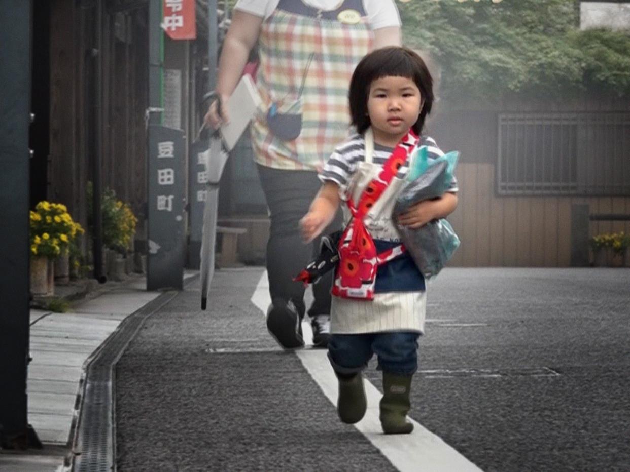 Girl walking on street