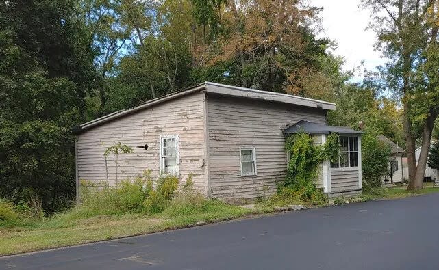 A house in New Jersey being converted by Habitat for Humanity into a new/restored home for a low- or moderate-income family.