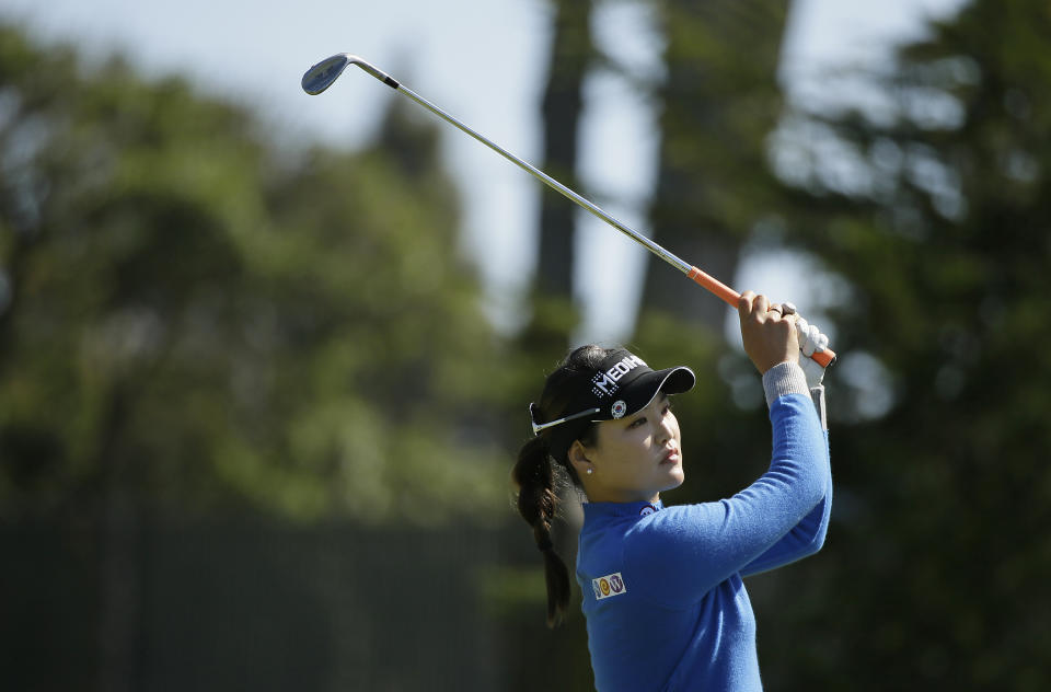 So Yeon Ryu, of South Korea, follows her approach shot to the 18th green of the Lake Merced Golf Club during the first round of the LPGA Mediheal Championship golf tournament Thursday, May 2, 2019, in Daly City, Calif. (AP Photo/Eric Risberg)