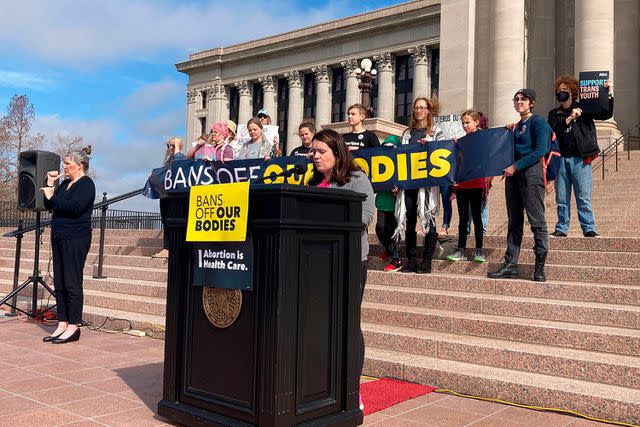 Sean Murphy/AP/Shutterstock Emily Wales, interim CEO of Planned Parenthood Great Plains Votes, speaks to abortion rights advocates outside the Oklahoma Capitol