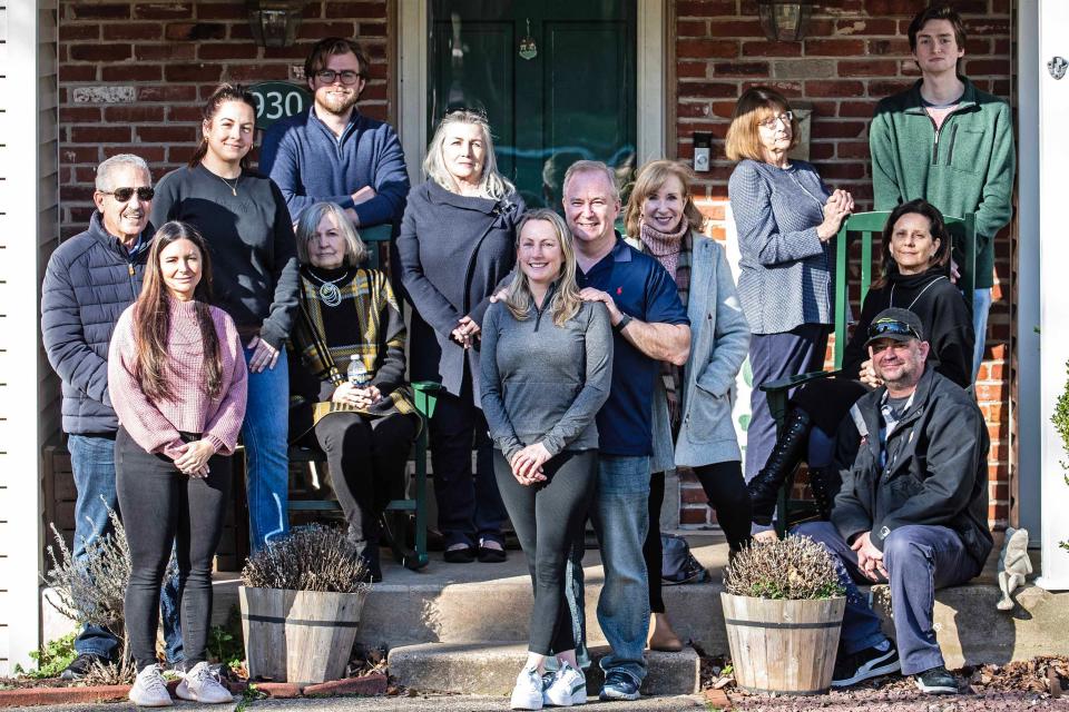 The family of Charles Steele, who has been missing since April 11, 2023, stands in front of Steele’s sister Kelly and her husband Mike Canning’s home in Claymont, Monday, March 11, 2024.