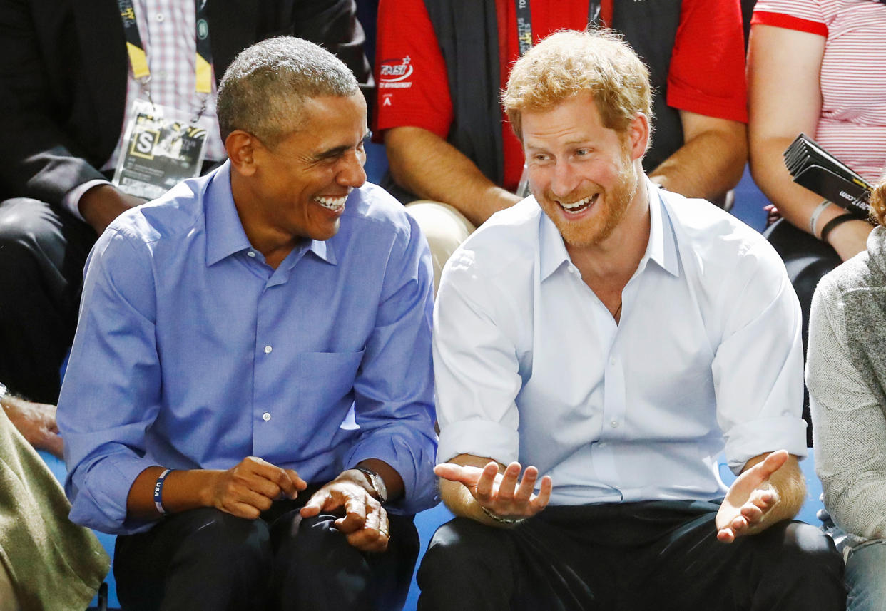 Britain's Prince Harry (R) and former U.S. President Barack Obama watch a wheelchair basketball event during the Invictus Games in Toronto, Ontario, Canada September 29, 2017.    REUTERS/Mark Blinch