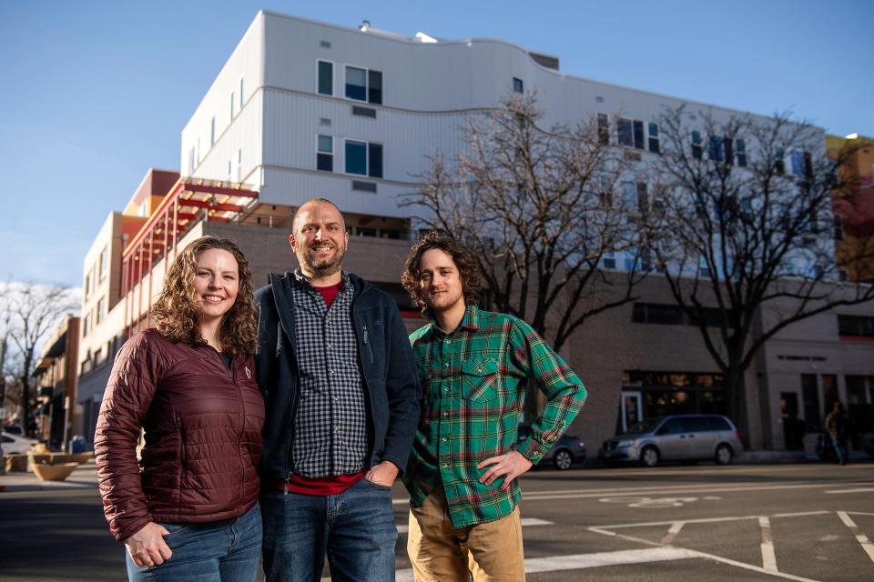 Kate Conley, Peter Erickson and Chris Conway are co-leads of the YIMBY Fort Collins chapter, formed in late 2022 around the events of the Fort Collins land us code changes. They are pictured outside Oak 140, an affordable housing project in Old Town Fort Collins.