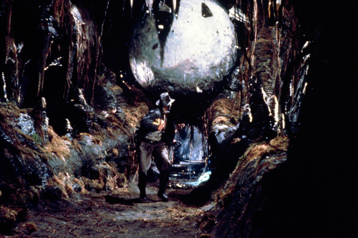 Indiana Jones (Ford) races away from certain death in the famous opening sequence of 'Raiders of the Lost Ark' (Photo: Paramount/courtesy Everett Collection)