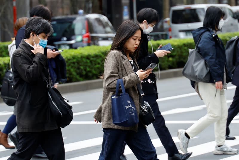 Japanese government relaxes official guidance on masks as it emerges from the COVID-19 pandemic, in Tokyo