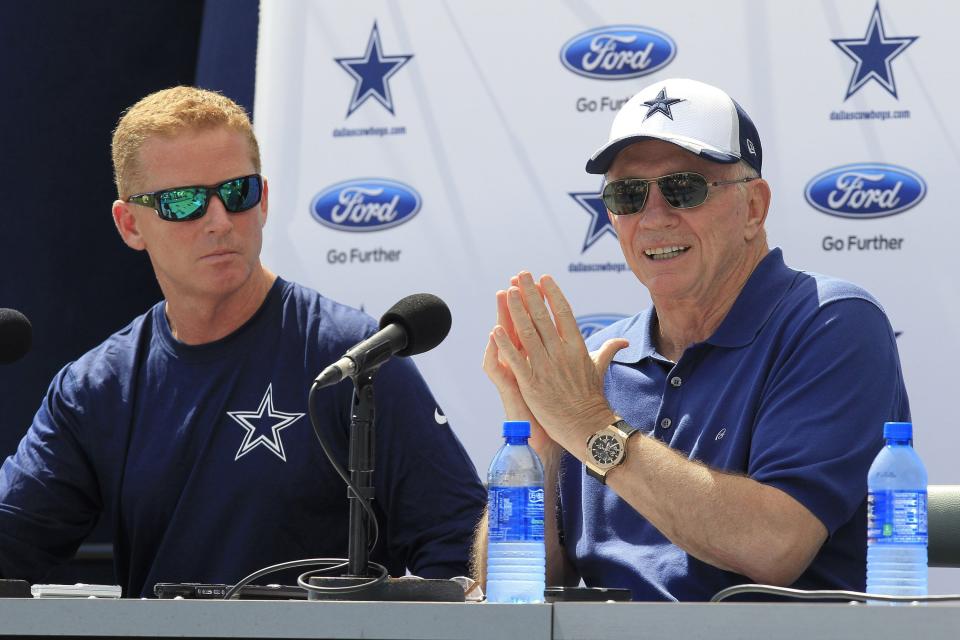 Jason Garrett is surely familiar by now with Jerry Jones addressing his job status. (AP/File)