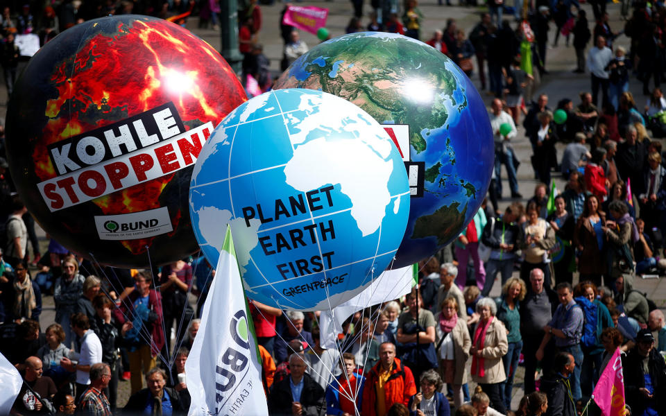 <p>People with giant balloons take part in protests ahead of the upcoming G20 summit in Hamburg, Germany July 2, 2017. (Hannibal Hanschke/Reuters) </p>