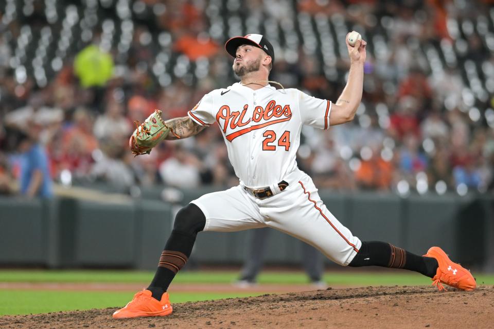 Orioles relief pitcher DL Hall throws a seventh inning pitch against the St. Louis Cardinals at Oriole Park at Camden Yards on Sept. 13, 2023.